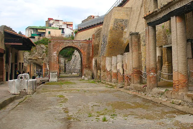 The Decumanus Maximus with its colonnade and brick arch