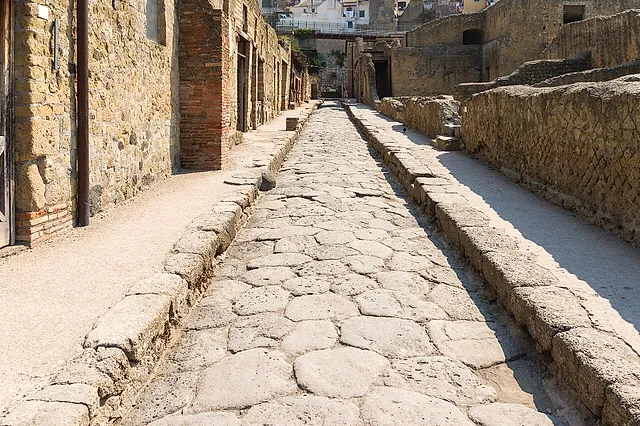 Paved Roman street between houses at Herculaneum