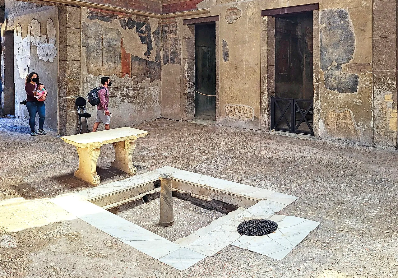 The atrium of the House of the Wooden Partition with its marble impluvium